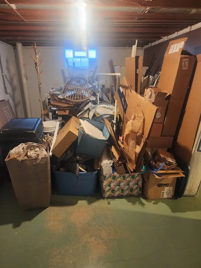 Roll-off dumpster container at job site for 8 Yard Dumpster Rental in Eastham